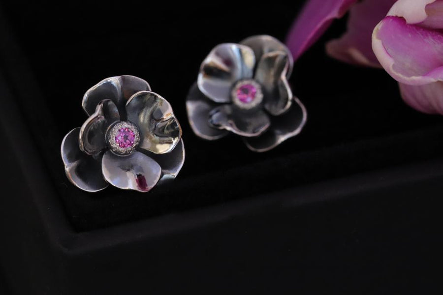 Flower stud earrings with rhodolite stone