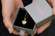 Gold Flower Pendant With Ruby