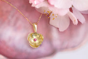 Gold Flower Pendant With Ruby