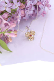 Silver Flower Pendant with Ruby