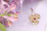 Silver Flower Pendant with Ruby