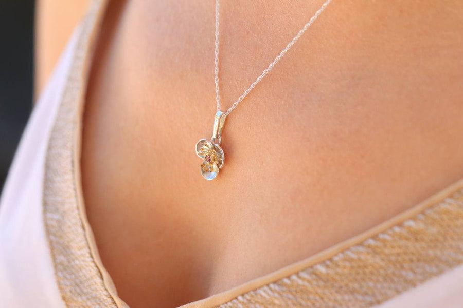 Silver Flower Pendant with Ruby